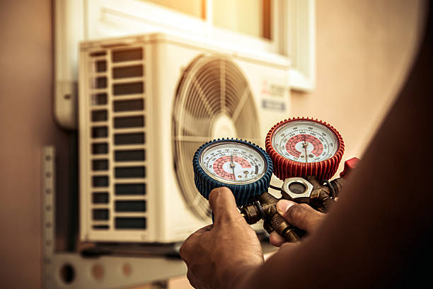Professional Air Conditioning Service technician working in Lilburn, GA